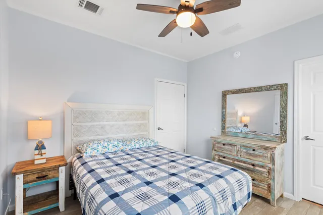 a bathroom with a toilet a sink and a mirror