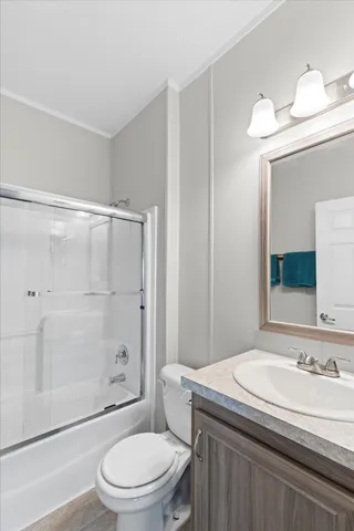 a view of a room with furniture and a potted plant