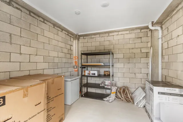 a aerial view of a house with a lake view