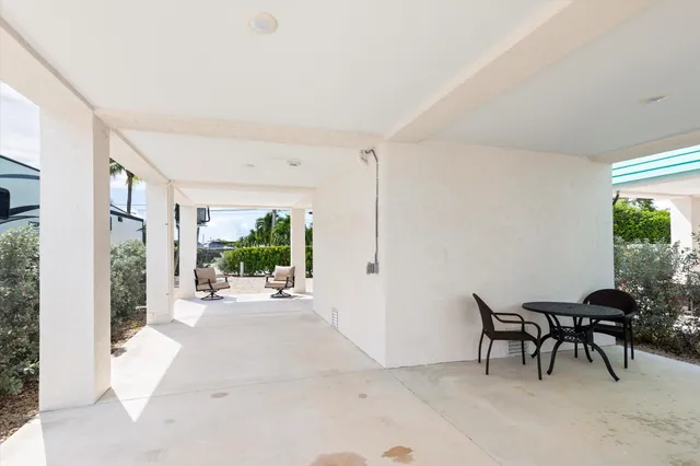 a kitchen with stainless steel appliances a sink stove and refrigerator
