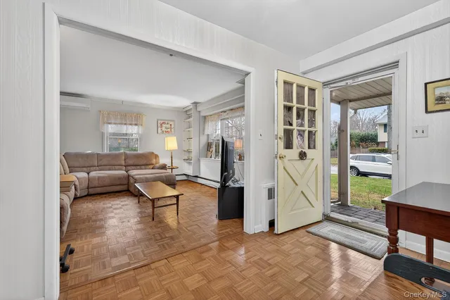 a living room with furniture and a couch