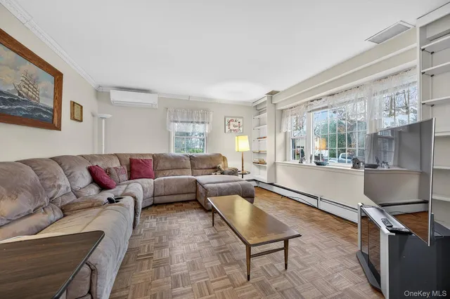 a living room with furniture and a couch