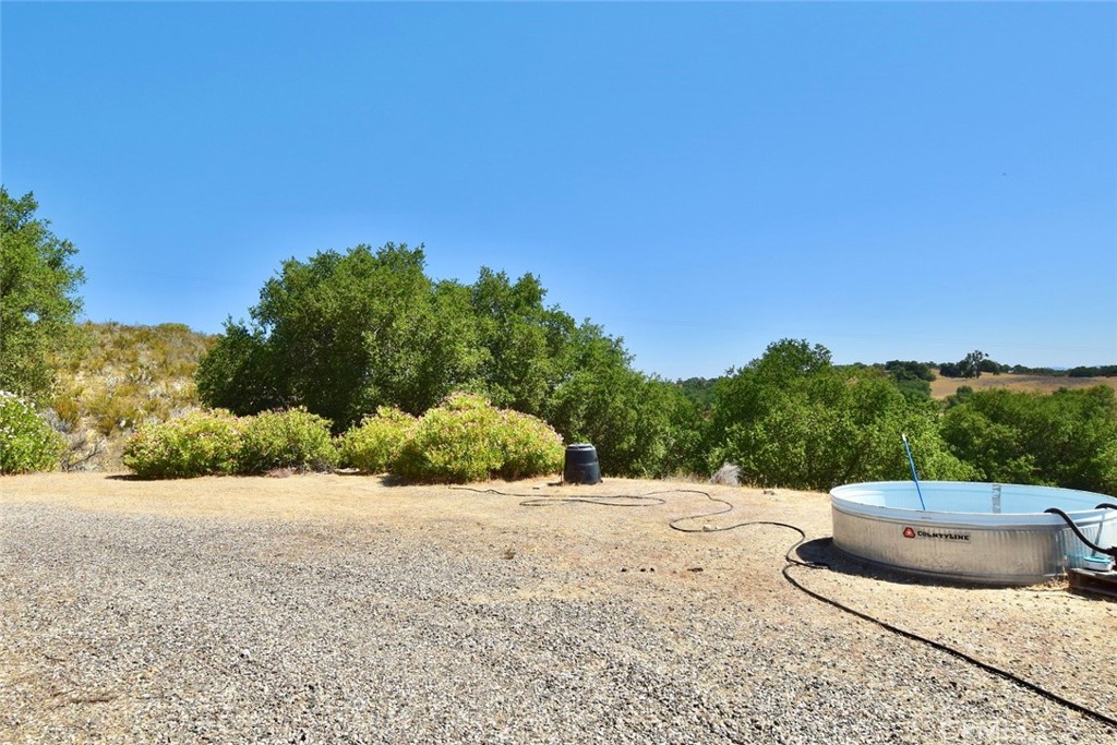 53292 Smith Road Bradley, CA 93426 - Photo 13 of 24 a view of a road with a yard