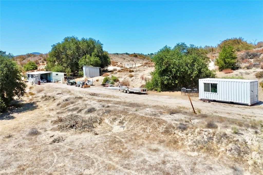 53292 Smith Road Bradley, CA 93426 - Photo 20 of 24 a backyard of a house with large trees and outdoor space