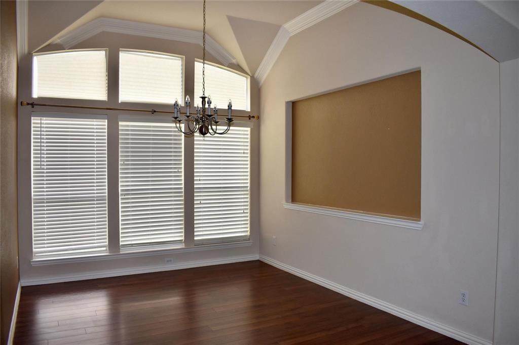 384 Spring Meadow Drive Fairview, TX 75069 - Photo 5 of 16 a view of a room that has wooden floor and a window
