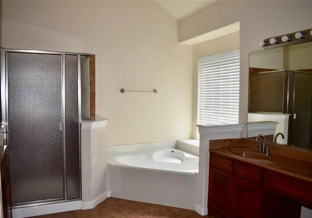 a bathroom with a sink and a bathtub