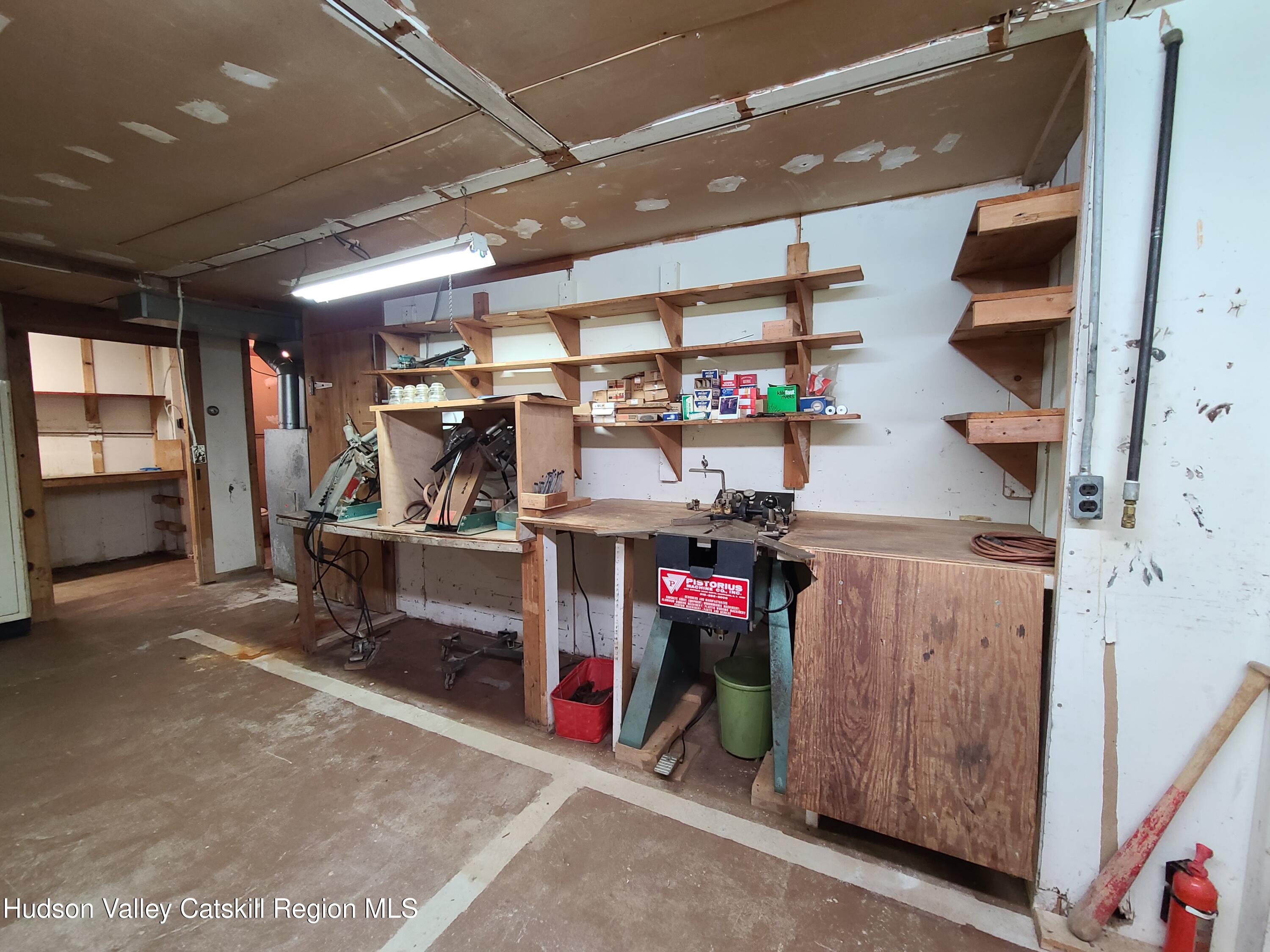 153 Shore Road Swan Lake, NY 12783 - Photo 23 of 45 a view of a storage room with a lot of stuff