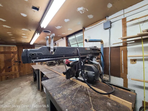 a kitchen with a sink a refrigerator and washer