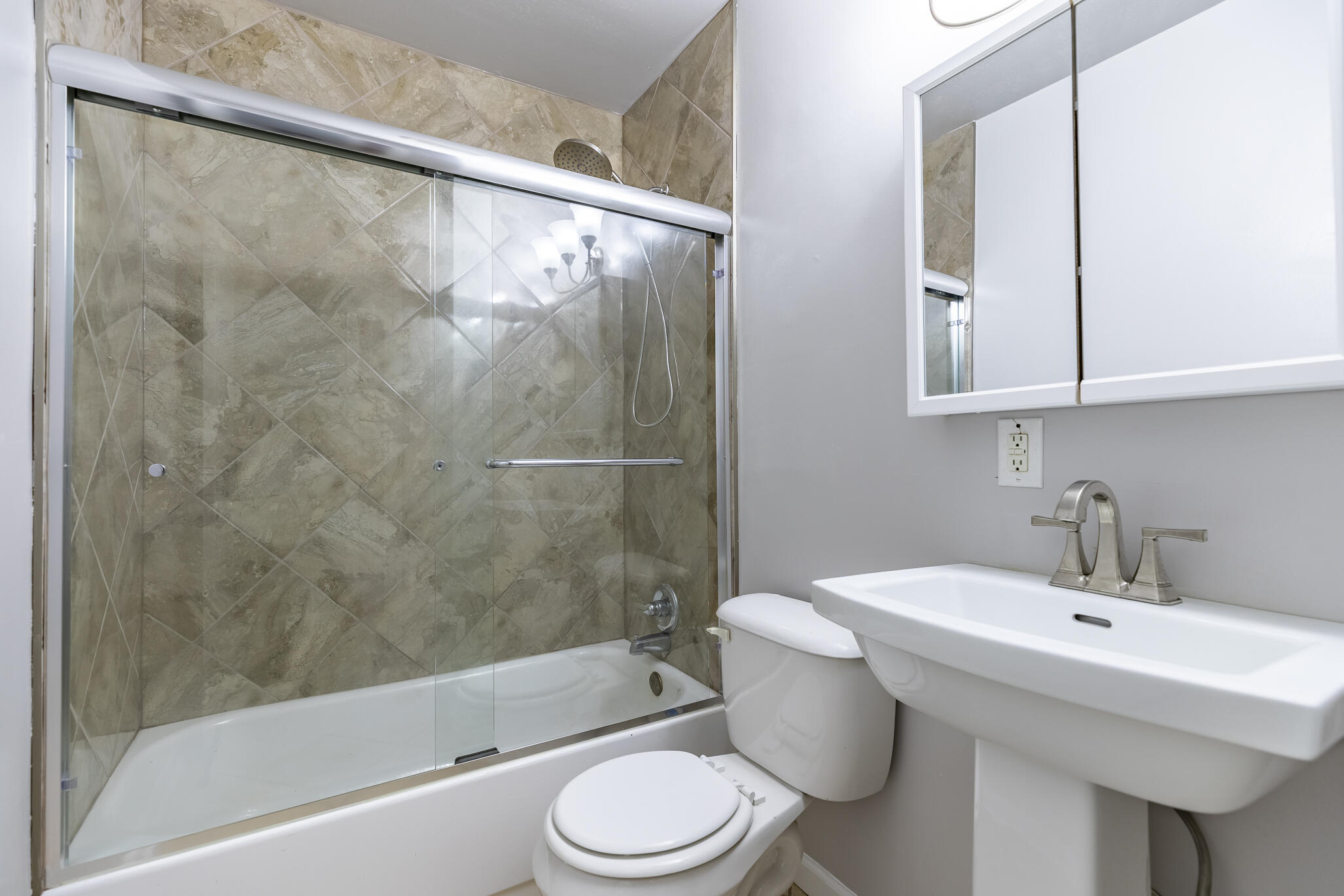 4836 Madison Street Gary, IN 46408 - Photo 12 of 21 a bathroom with a sink toilet and shower