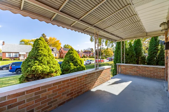 a view of a room with wooden floor and outdoor space