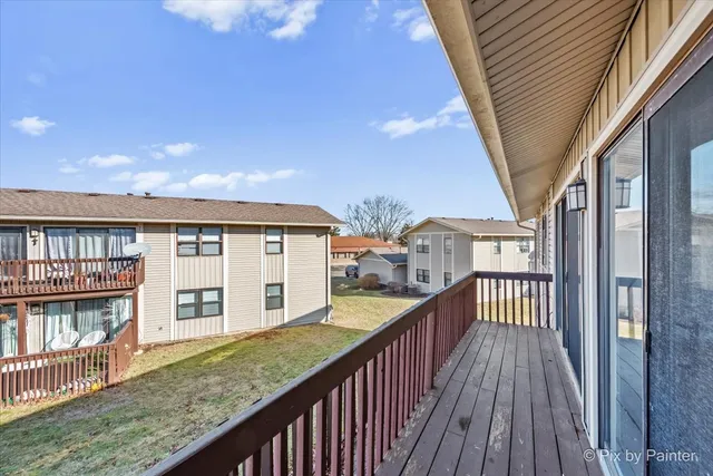 a view of a lake from a balcony