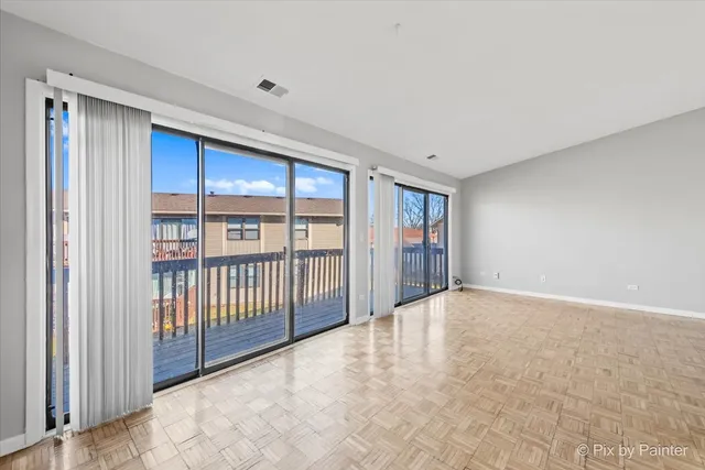a view of an empty room with window