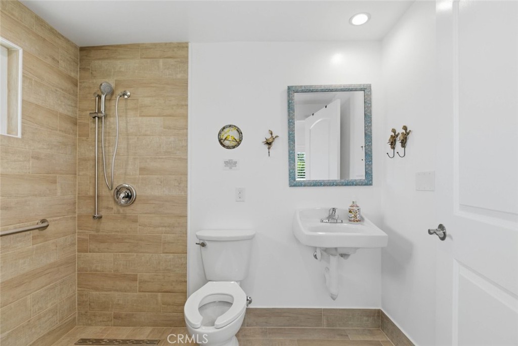 301 West Ashby Street Azusa, CA 91702 - Photo 62 of 75 a bathroom with a sink toilet and shower