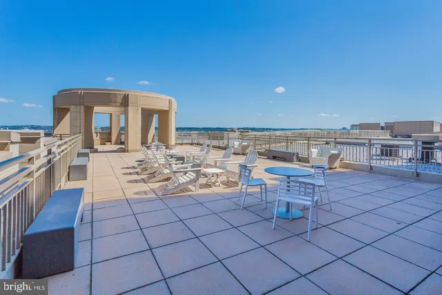 a view of a terrace with chairs