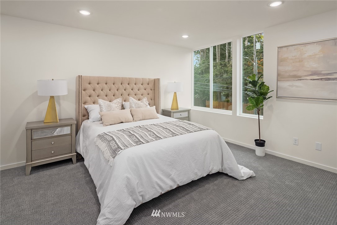 13735 35th Avenue Northeast, Unit B Seattle, WA 98125 - Photo 14 of 20 a bedroom with a bed and a window