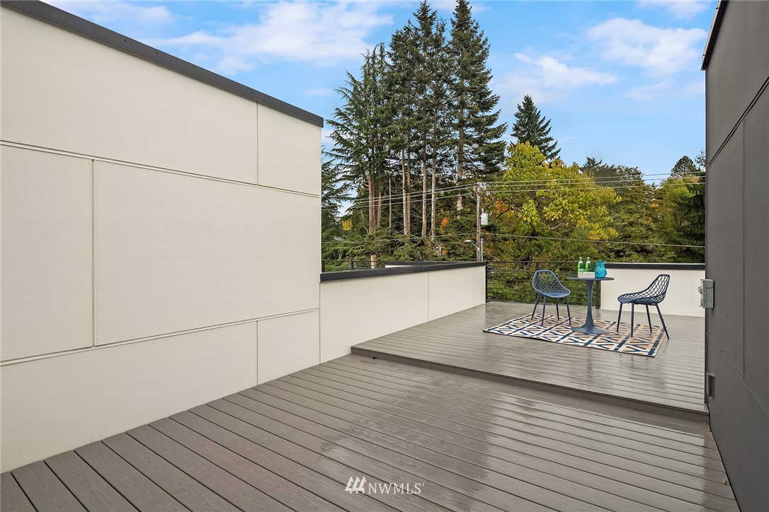 13735 35th Avenue Northeast, Unit B Seattle, WA 98125 - Photo 18 of 20 a view of a chairs and table on the wooden floor