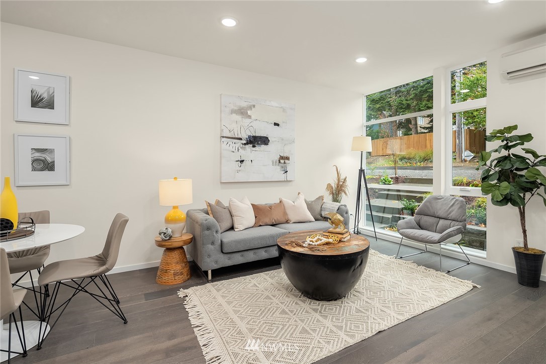 13735 35th Avenue Northeast, Unit B Seattle, WA 98125 - Photo 3 of 20 a living room with furniture and a potted plant