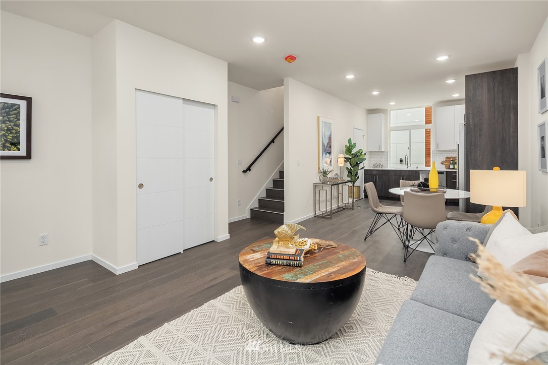13735 35th Avenue Northeast, Unit B Seattle, WA 98125 - Photo 4 of 20 a living room with dining room and wooden floor
