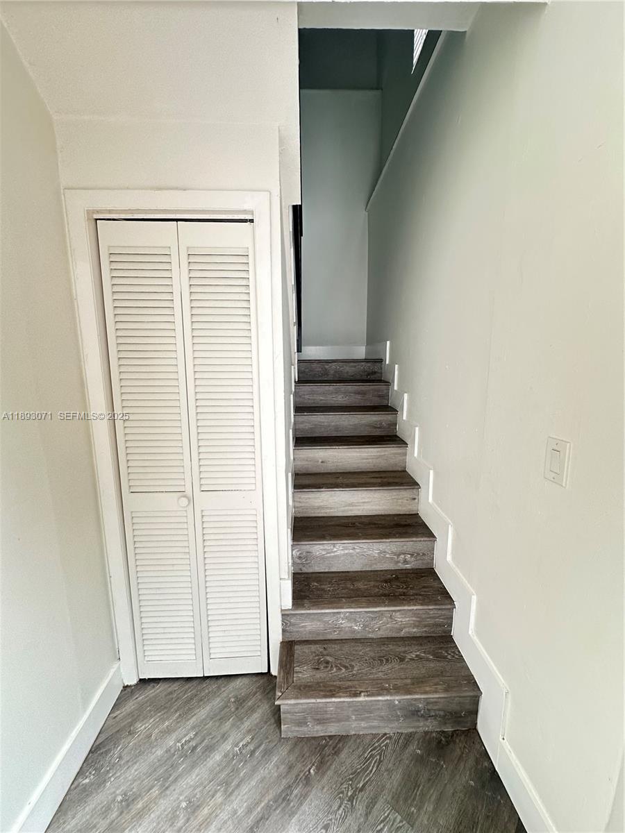 97 Northwest 73rd Place, Unit 12 Miami, FL 33126 - Photo 13 of 20 a view of entryway with wooden floor