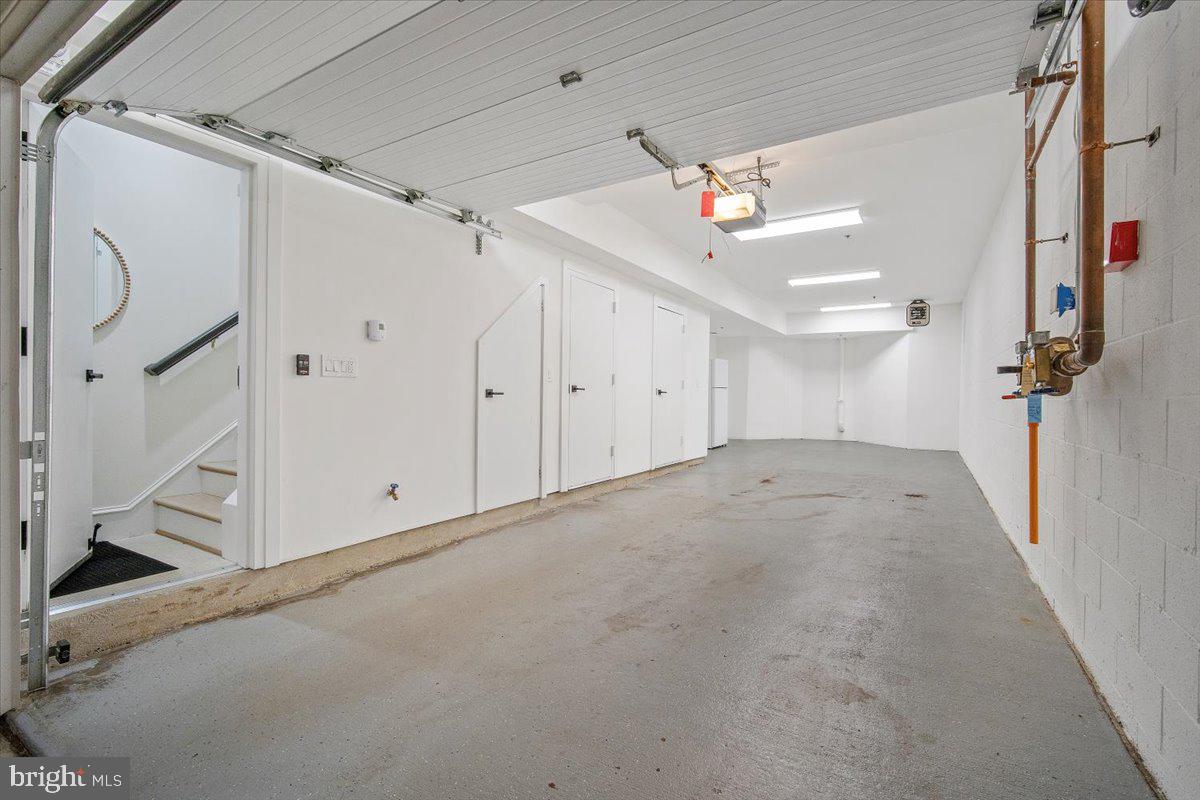 7453 Arlington Road Bethesda, MD 20814 - Photo 16 of 21 Private oversized 2 car tandem garage w/ storage