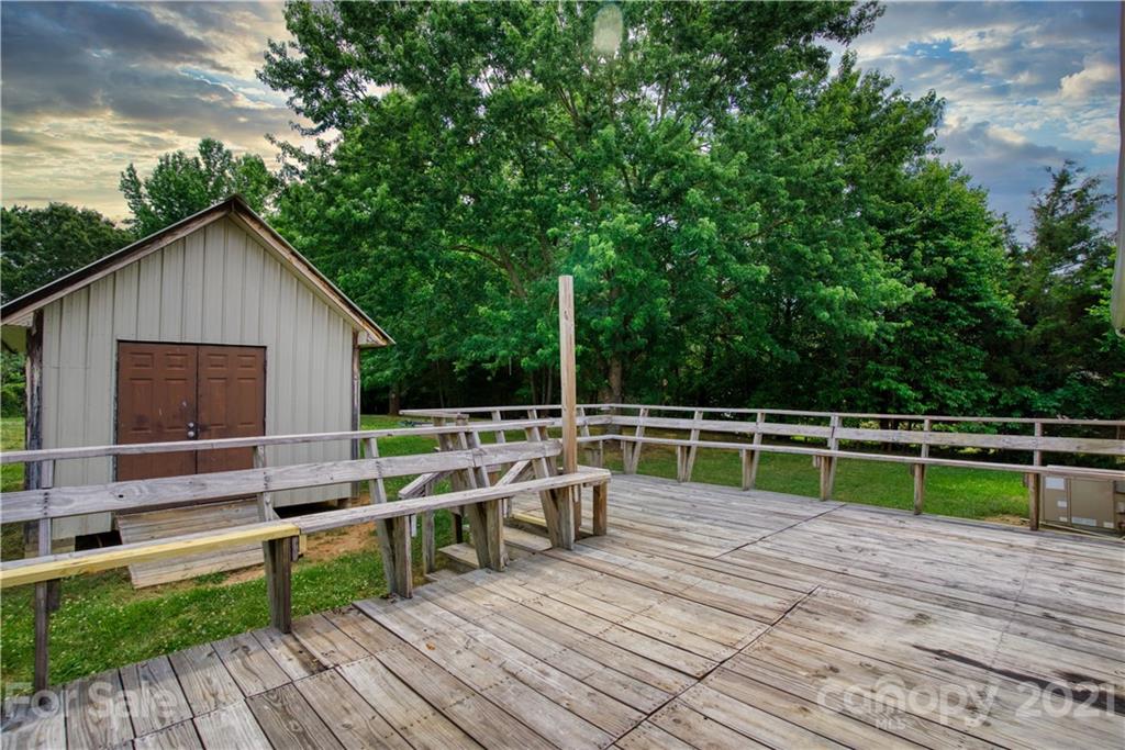 2345 Sides Road Rockwell, NC 28138 - Photo 12 of 19 a view of house with deck and yard
