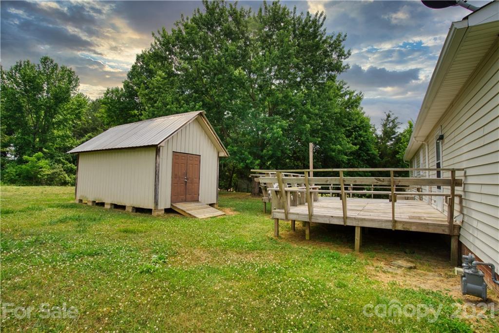 2345 Sides Road Rockwell, NC 28138 - Photo 14 of 19 a view of a backyard with sitting area
