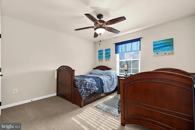 a bedroom with a bed and furniture