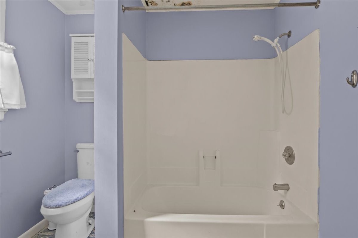 7158 Bahne Road Fairview, TN 37062 - Photo 19 of 37 a bathroom with a shower and a toilet