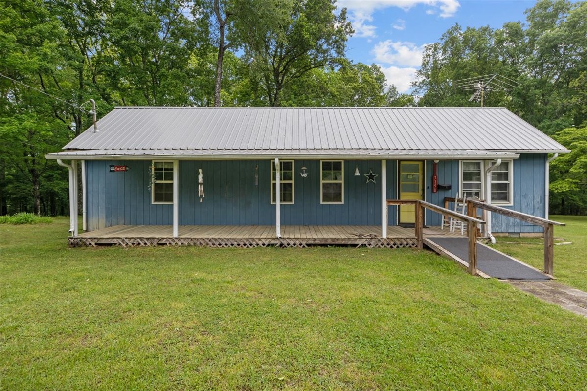7158 Bahne Road Fairview, TN 37062 - Photo 2 of 37 a backyard of a house with table and chairs