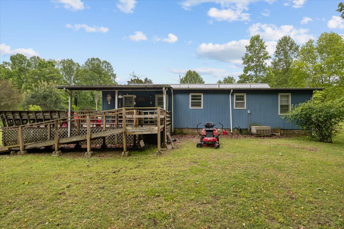 7158 Bahne Road Fairview, TN 37062 - Photo 26 of 37 a view of a backyard with a sitting area and furniture