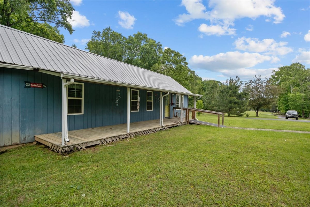 7158 Bahne Road Fairview, TN 37062 - Photo 3 of 37 a view of a house with backyard porch and garden