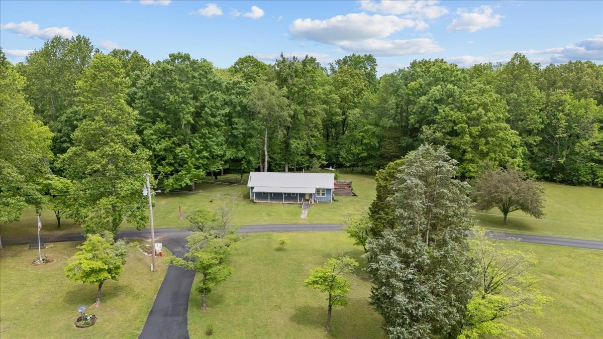 7158 Bahne Road Fairview, TN 37062 - Photo 33 of 37 a backyard of a house with lots of green space