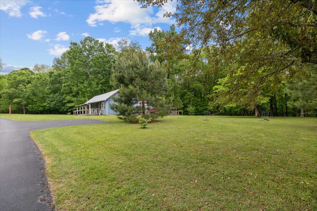 7158 Bahne Road Fairview, TN 37062 - Photo 36 of 37 a view of a house with a yard