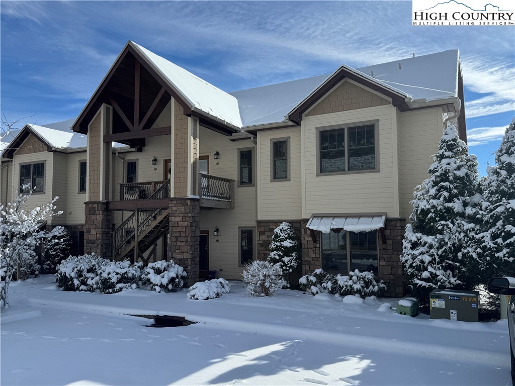311 Penny Lane, Unit 2D Banner Elk, NC 28604 - Photo 38 of 38 a view of a house with a yard