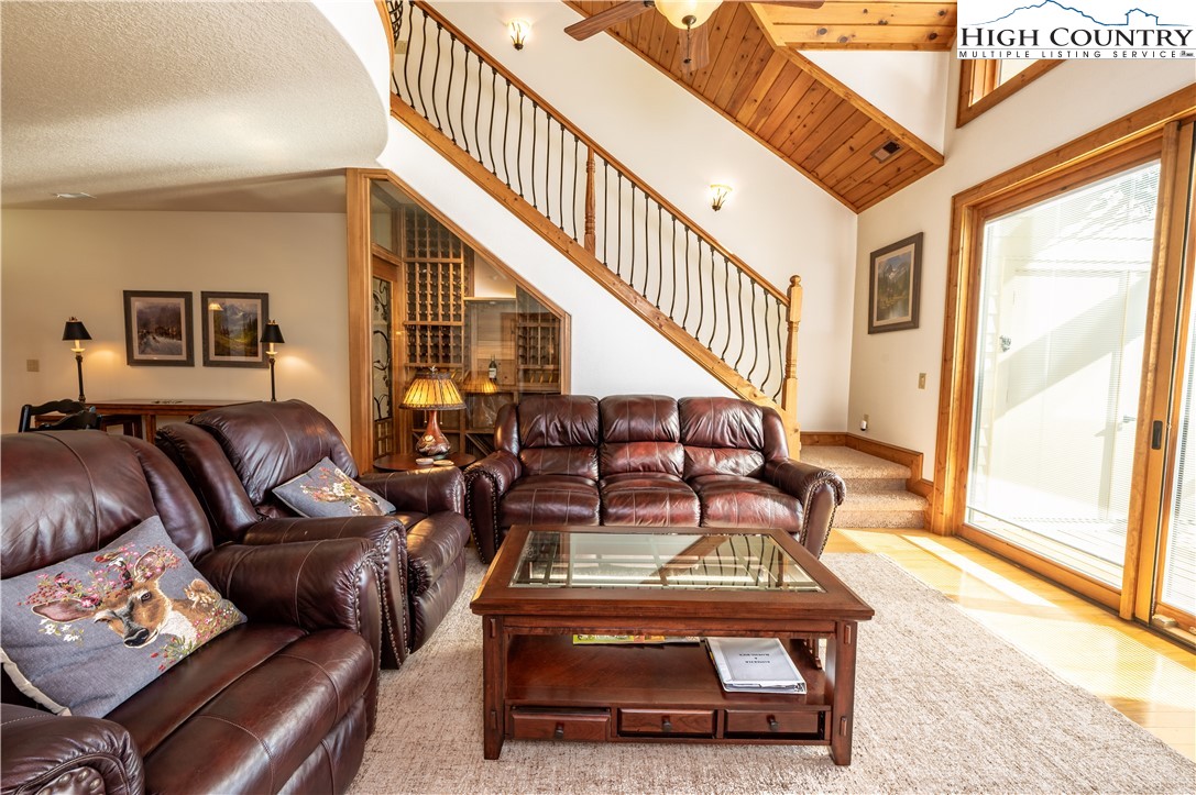 311 Penny Lane, Unit 2D Banner Elk, NC 28604 - Photo 10 of 38 a living room with furniture