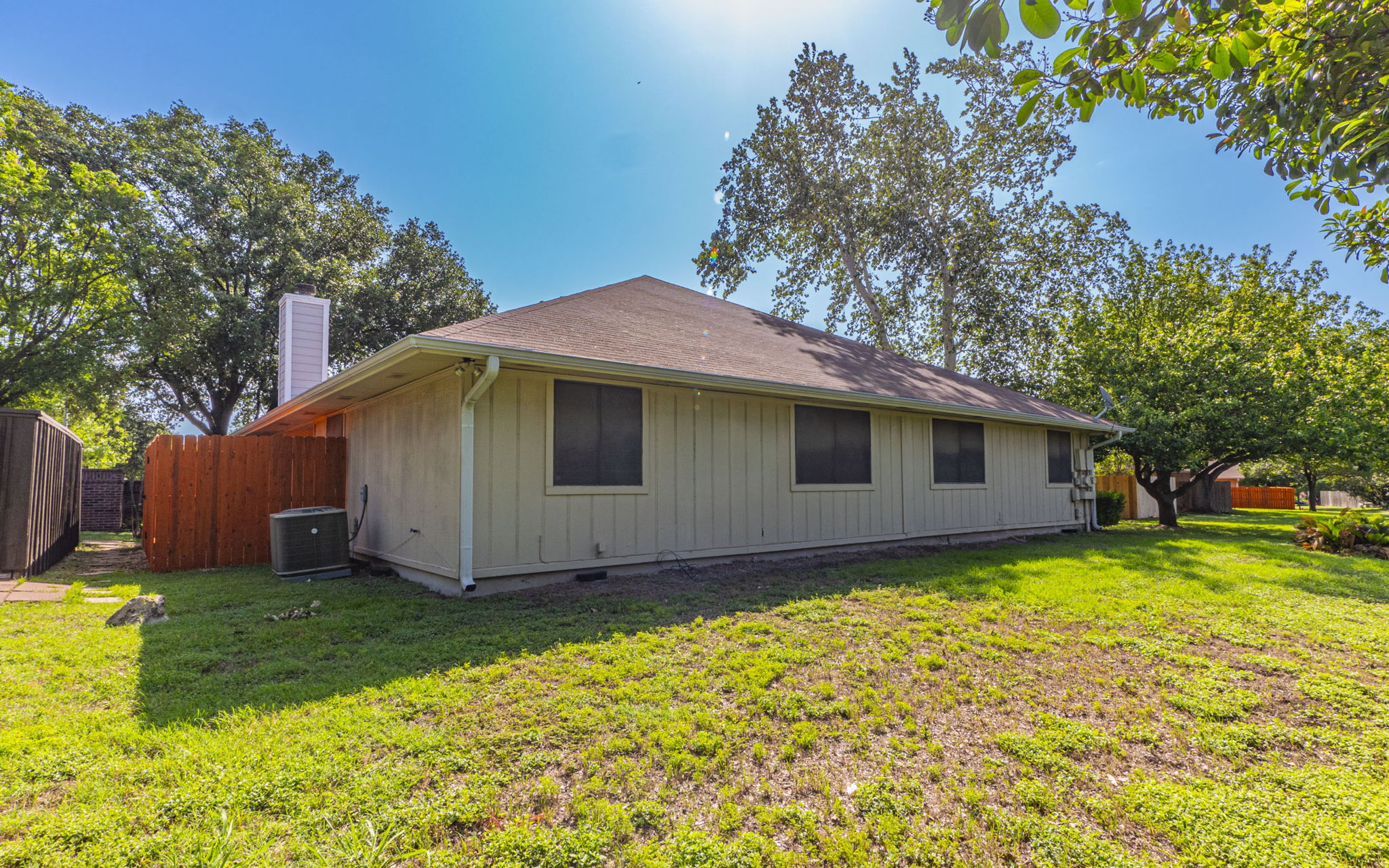 1007 Markham Lane, Unit A Austin, TX 78753 - Photo 13 of 15 a view of a house with a yard