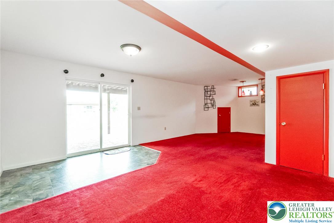 2226 Red Maple Drive Coplay, PA 18037 - Photo 38 of 69 L-shaped walk-out basement family room