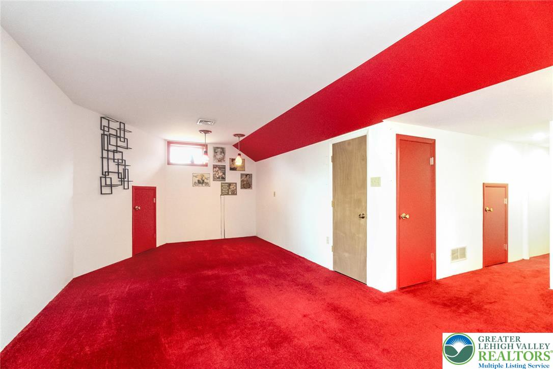 2226 Red Maple Drive Coplay, PA 18037 - Photo 39 of 69 L-shaped walk-out basement family room