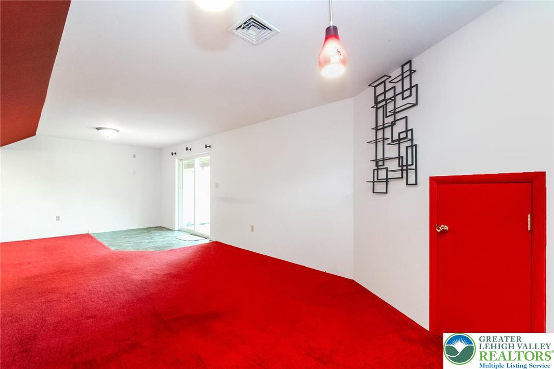 2226 Red Maple Drive Coplay, PA 18037 - Photo 40 of 69 L-shaped walk-out basement family room