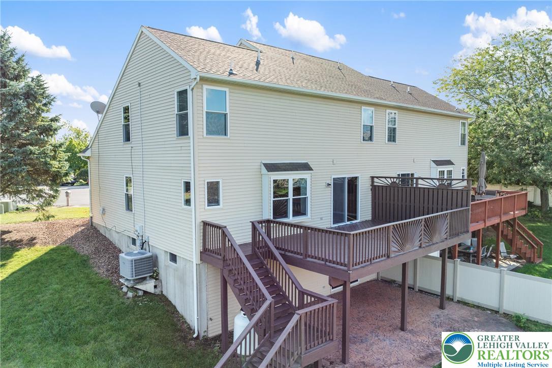 2226 Red Maple Drive Coplay, PA 18037 - Photo 45 of 69 a view of a chairs and table on the wooden deck