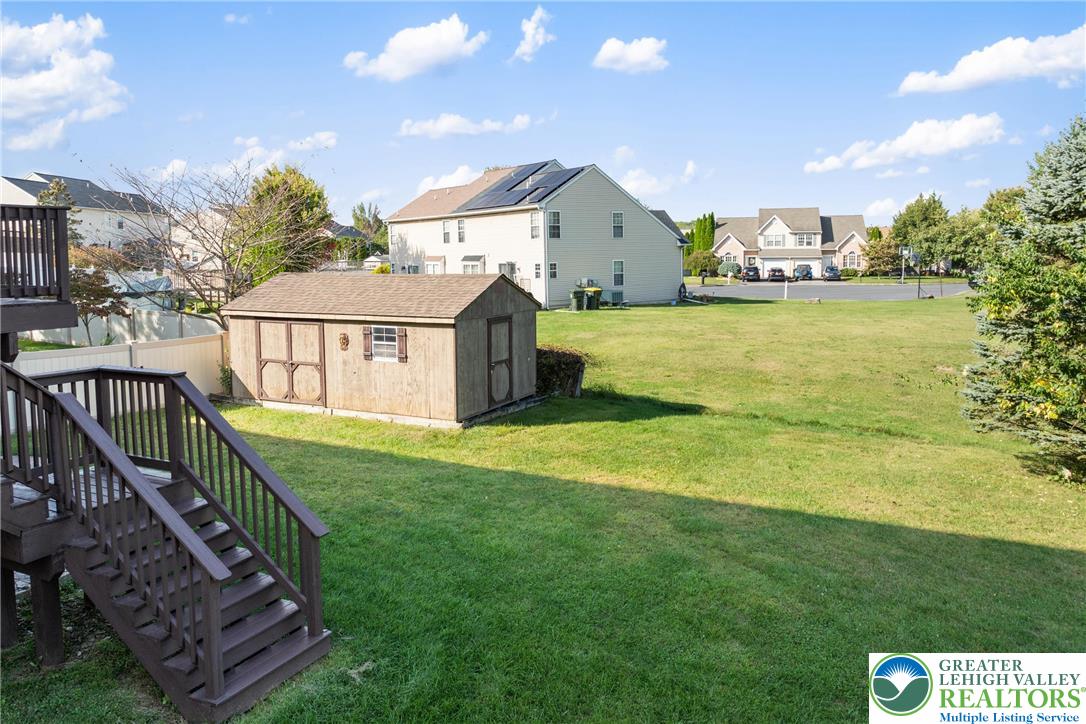 2226 Red Maple Drive Coplay, PA 18037 - Photo 46 of 69 a view of a house with a yard and a porch