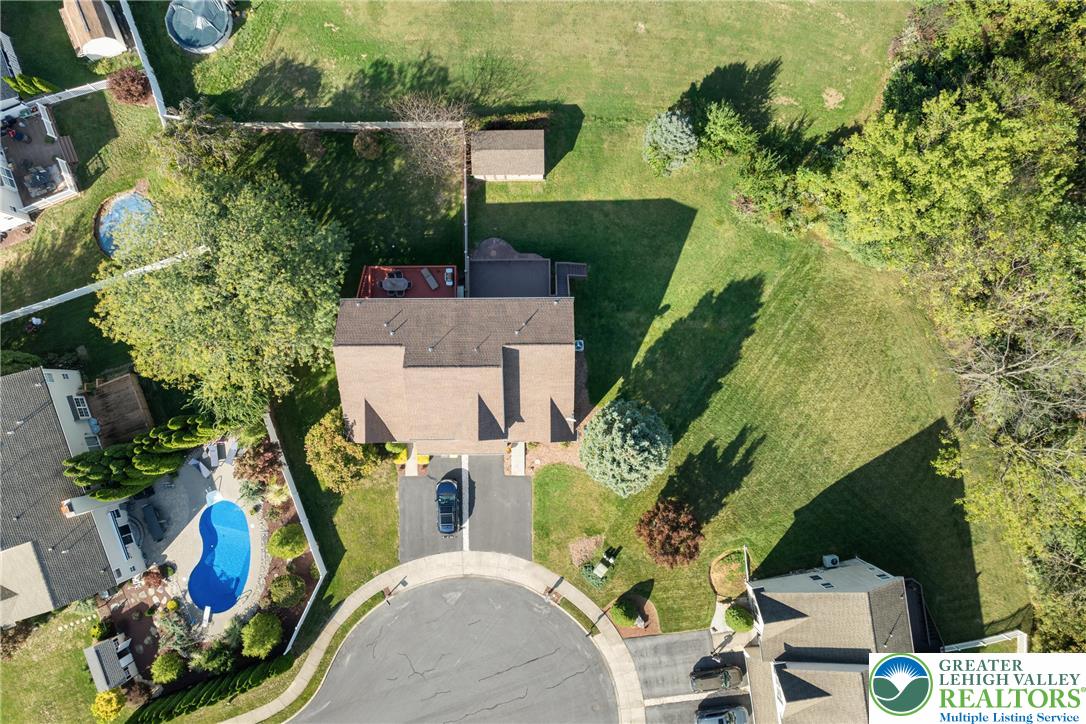 2226 Red Maple Drive Coplay, PA 18037 - Photo 48 of 69 an aerial view of a house with a yard and lake view