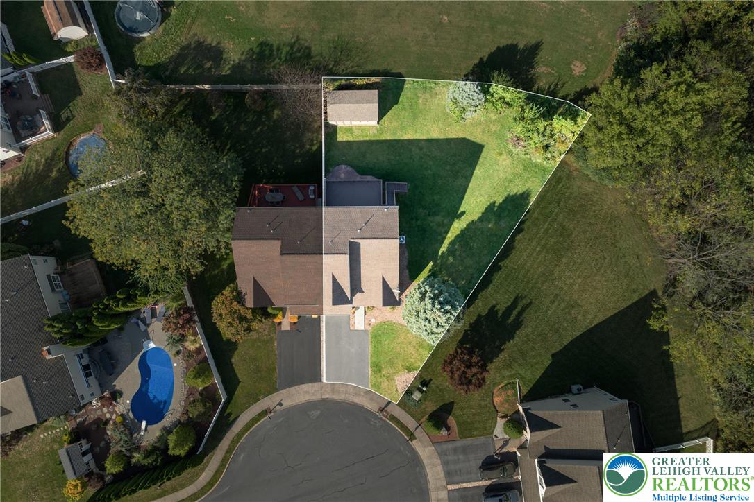 2226 Red Maple Drive Coplay, PA 18037 - Photo 49 of 69 an aerial view of a house with a yard and parking space