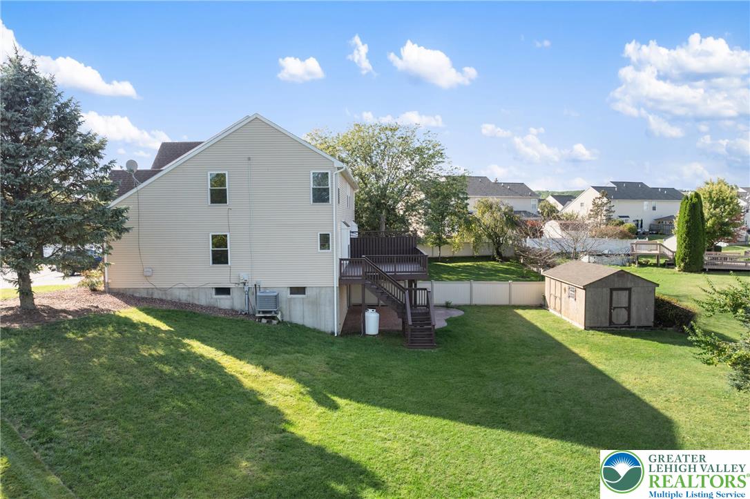 2226 Red Maple Drive Coplay, PA 18037 - Photo 58 of 69 a view of a house with a back yard