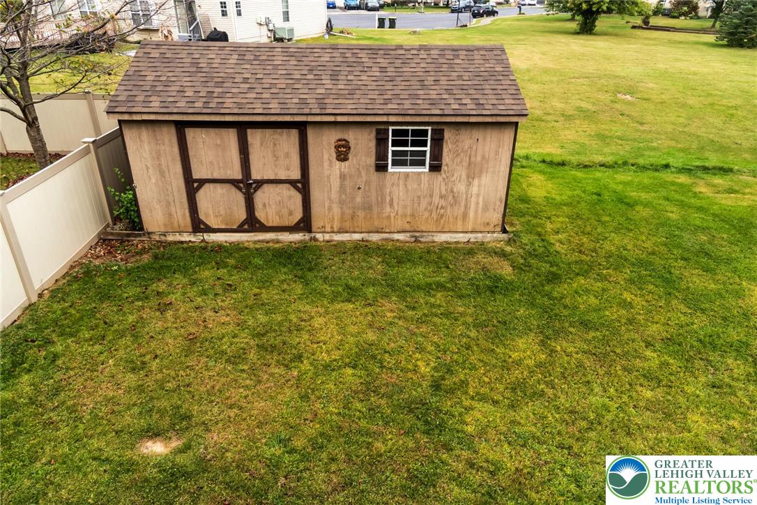 2226 Red Maple Drive Coplay, PA 18037 - Photo 61 of 69 a backyard of a house with lots of green space