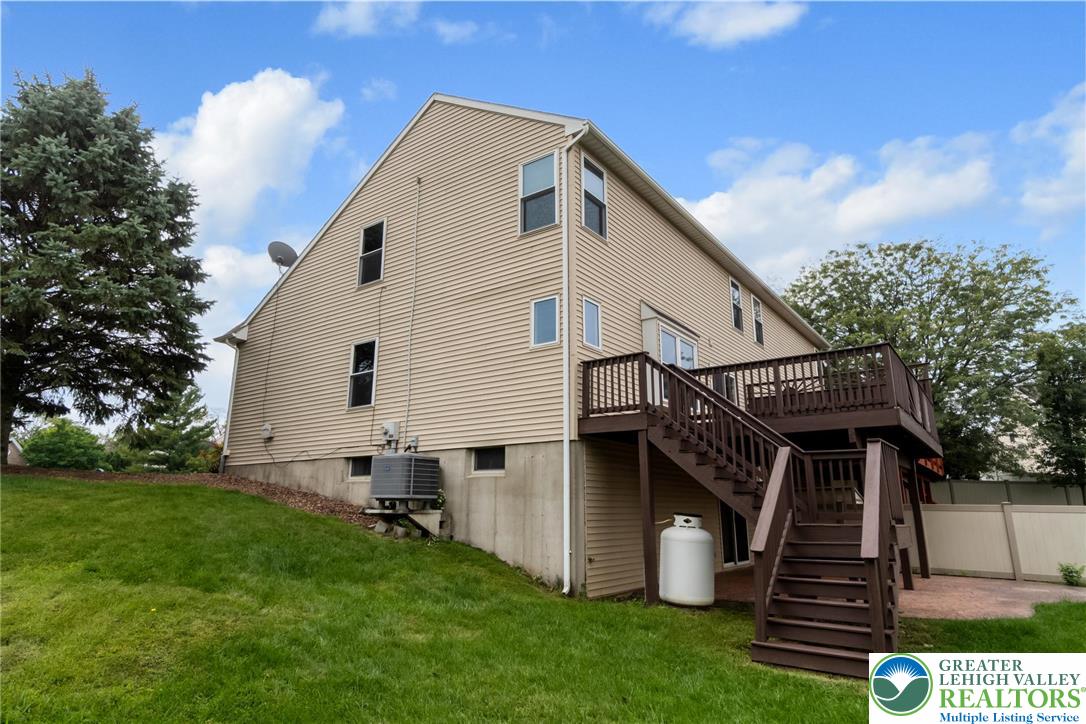 2226 Red Maple Drive Coplay, PA 18037 - Photo 65 of 69 a view of a house with backyard and a garden