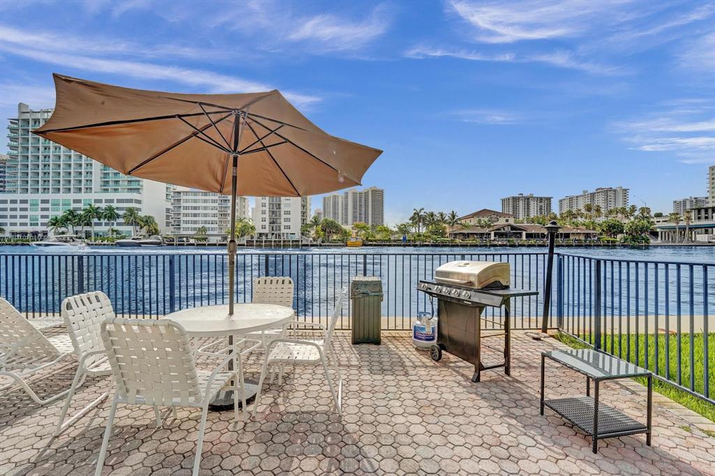 2895 Northeast 32nd Street, Unit 206 Fort Lauderdale, FL 33306 - Photo 13 of 22 a view of a roof deck with furniture