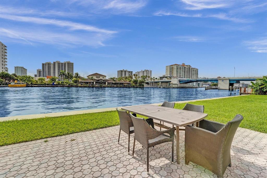 2895 Northeast 32nd Street, Unit 206 Fort Lauderdale, FL 33306 - Photo 14 of 22 a view of a roof with sitting area
