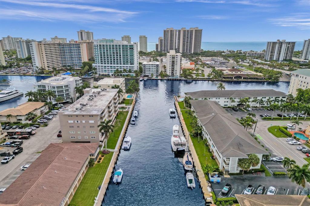 2895 Northeast 32nd Street, Unit 206 Fort Lauderdale, FL 33306 - Photo 16 of 22 a view of a city with tall buildings