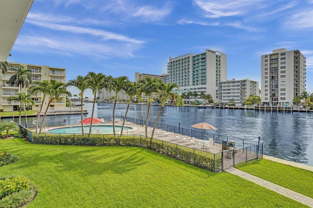2895 Northeast 32nd Street, Unit 206 Fort Lauderdale, FL 33306 - Photo 18 of 22 a view of a city with tall buildings and a big yard